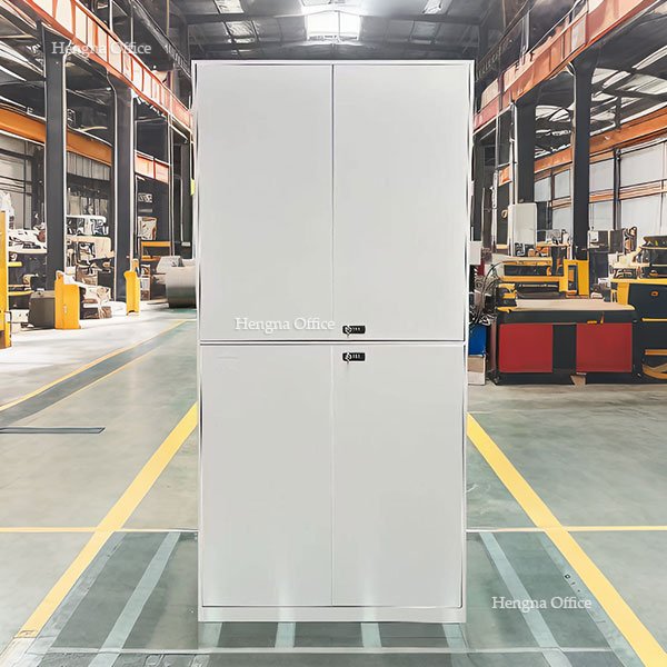 Steel lockers in factory locker room with individual keyed locks for employee storage